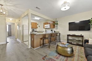 Flat-screen TV, books - 2 Pools! Have The Best Vacation! A Stylish Beach Retreat (Biloxi)