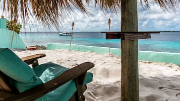 On the beach, sun-loungers, beach towels