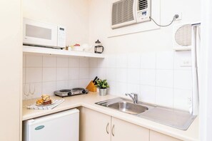 Fridge, microwave, electric kettle, toaster
