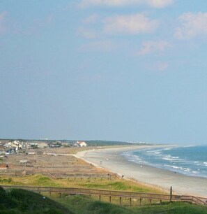 North Litchfield Beach with a boardwalk, beach, and ocean view. - Gorgeous, Minutes to Beach, Updated Retreat 414 (Pawleys Island)