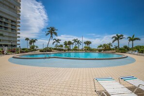 A heated pool - Beachfront 2BR/2BA South Seas condo with pool, WiFi, and full kitchen. (Marco Island)