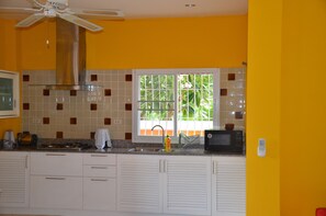 Microwave, coffee/tea maker, cookware/dishes/utensils