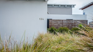 A modern building with a concrete facade and a wooden fence. - Awesome 180° View 5*s
Central Location AVAILABLE NOV 15!










 (Albany)