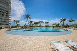 A heated pool - Beachfront 2BR, 2BA South Seas condo with pool, WiFi, and full kitchen. (Marco Island)