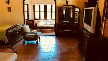 Room, Multiple Beds, Non Smoking | Living area | LCD TV