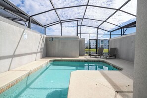 Outdoor pool, a heated pool, pool loungers
