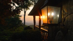 A stone building with a glass lantern-style window. - Gated Luxury Lodge - Hot Tub, Mountain Views, Stunning Gardens, Secluded (Franklin)