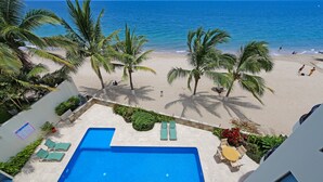 A pool area with a view of the beach and ocean. - 😍ROMANTIC GETAWAY😍AMAZING OCEAN VIEWS -HOP, SKIP & JUMP TO THE BEACH -GR8 POOL (Puerto Vallarta)
