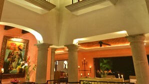 A multi-level atrium with balconies, columns, and a central seating area. - Spacious Open-Air Villa w/Unequaled Luxury/Views, 5 Mins to Town, Chef & Staff (Puerto Vallarta)