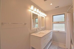 Combined shower/bathtub, hair dryer, towels - Wonderful Three Bedroom Home on the 11-Mile Lagoon! (Hilton Head)