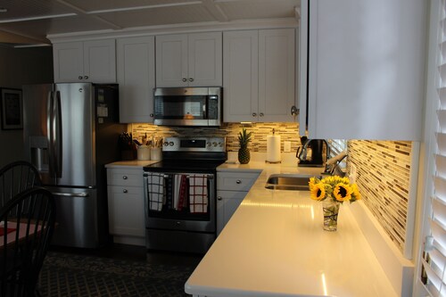 Close to the beach, clean and comfy!  Your pooch is welcome. 