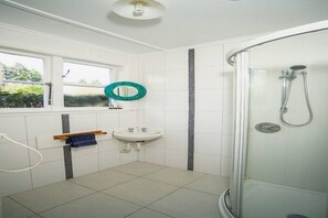 Bathtub, hair dryer, towels
