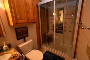 Combined shower/bathtub, hair dryer, towels, soap -  Family friendly log home has great lake views from huge deck! (Vian)