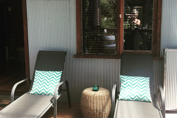 One set of loungers on the deck, the other set is under the Eucalyptus.