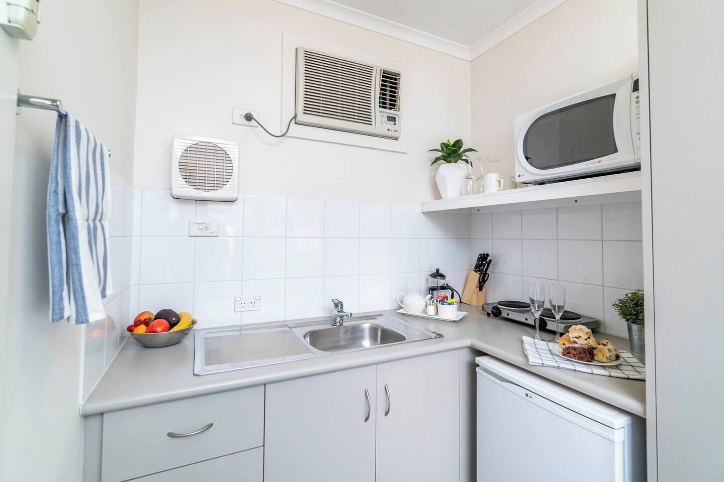 Fridge, microwave, electric kettle, toaster