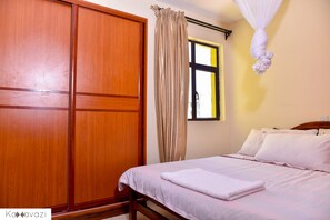 2 habitaciones, tabla de planchar con plancha y wifi gratis 