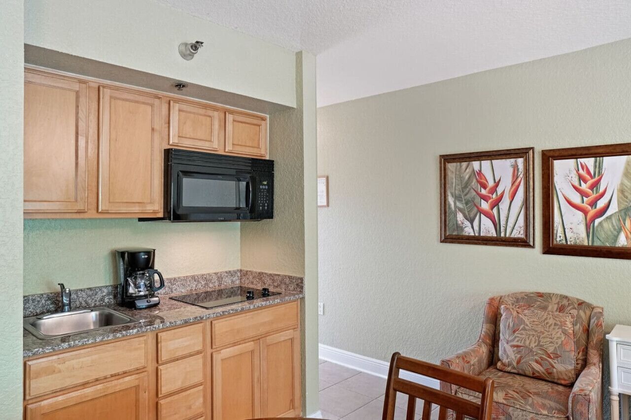 Fridge, microwave, stovetop, coffee/tea maker