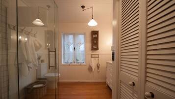 Shower, hair dryer, bathrobes, towels