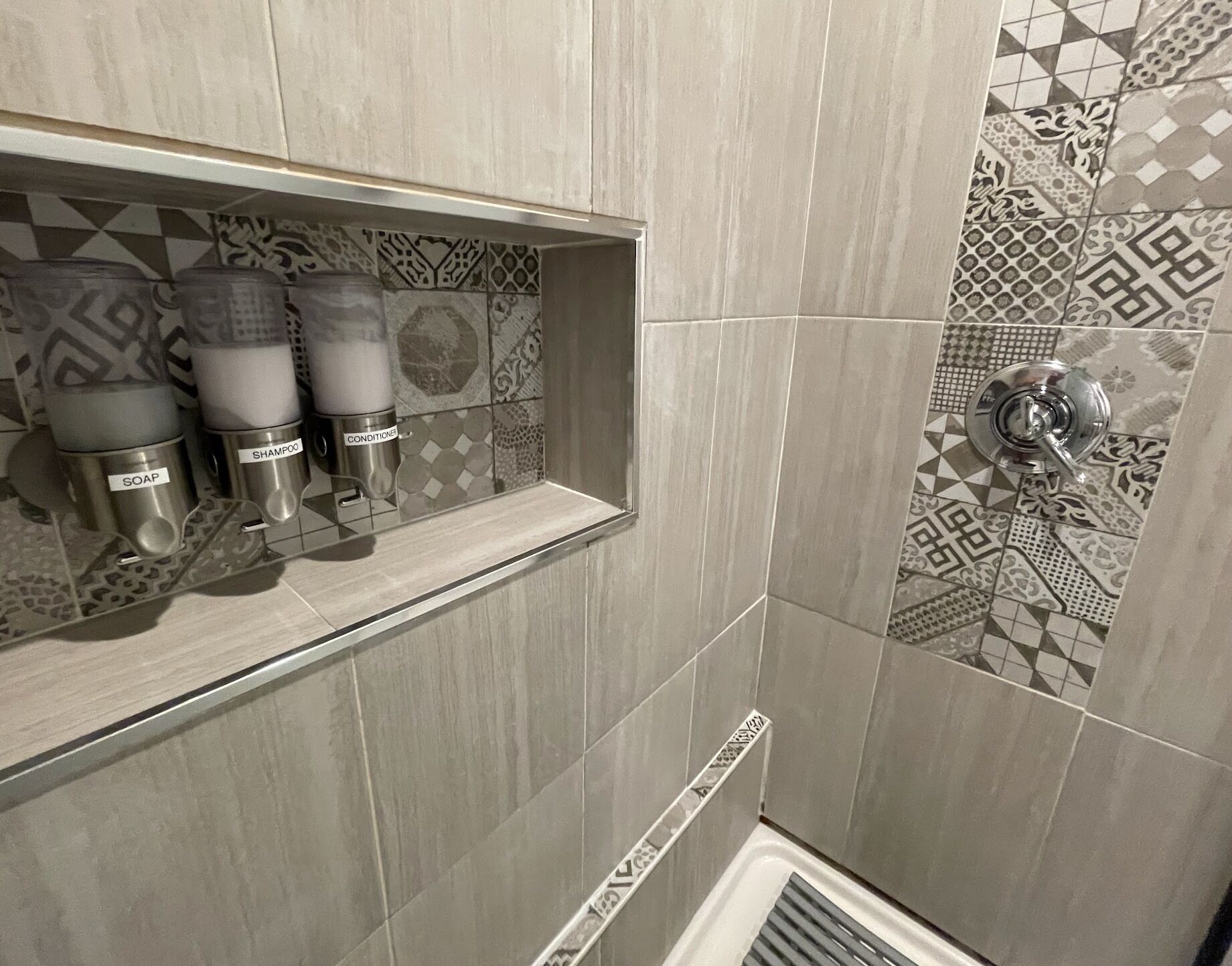 Shower, rainfall showerhead, hair dryer, towels
