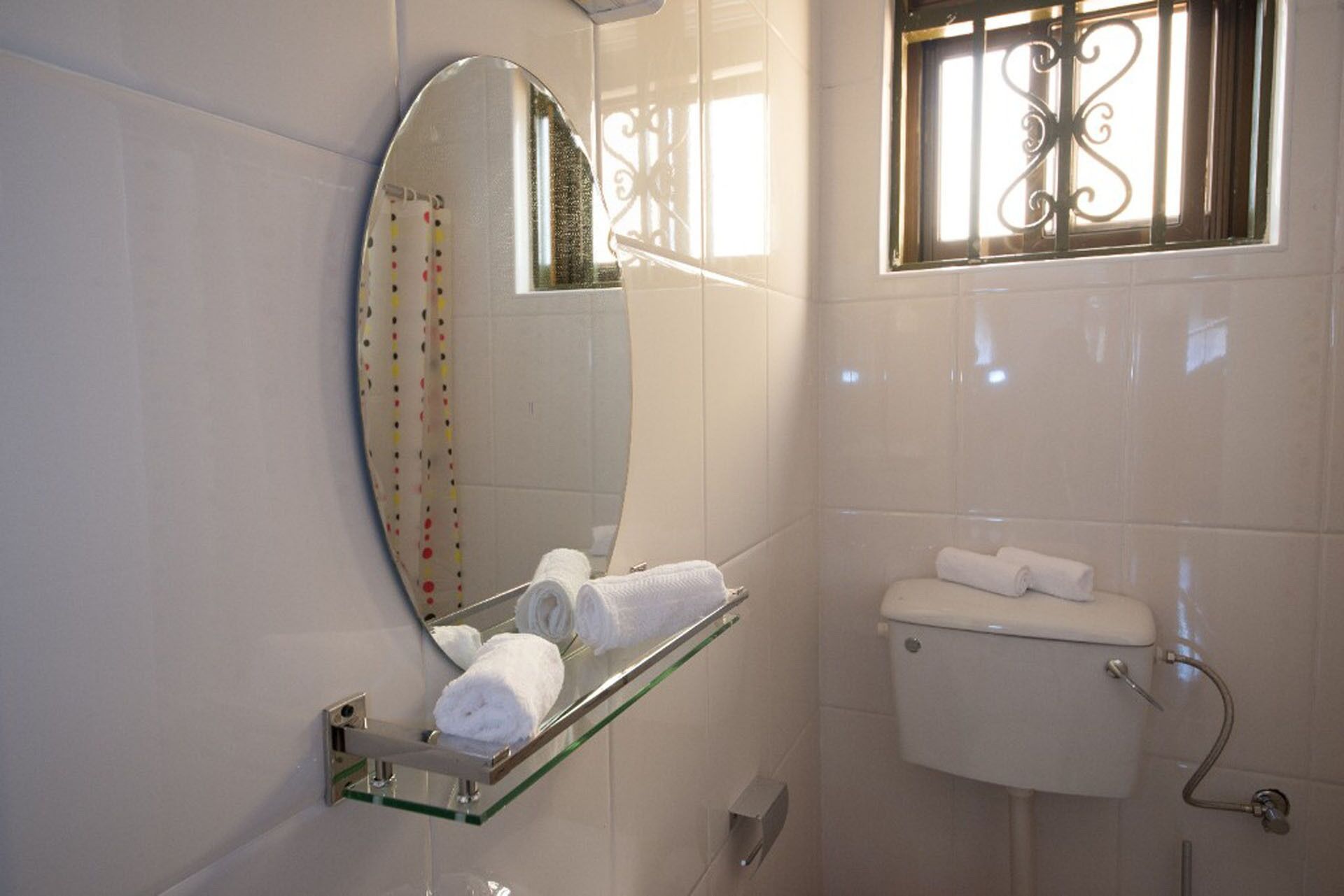 Shower, towels, soap, toilet paper