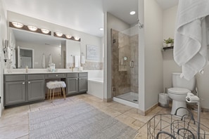 Combined shower/bathtub, hair dryer, towels, soap
