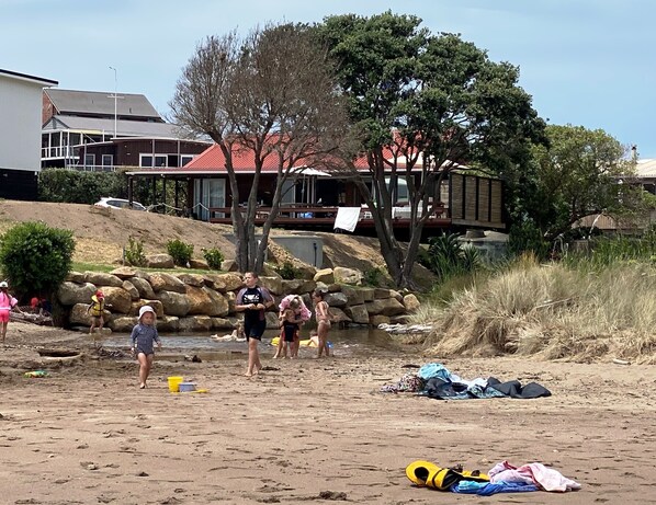 On the beach, sun-loungers, beach towels