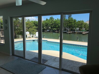 Waterfront Island Home with Dock, Pool and just steps to the Beach!