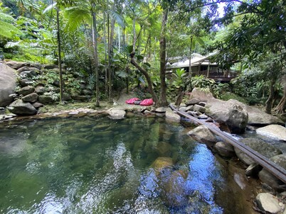 Unique holiday home with private waterfalls and swimming pool right by your deck