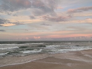 Na praia, toalhas de praia