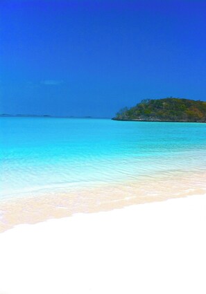 On the beach, sun-loungers, beach towels
