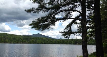 Waterfront Chalet with private beach in the White Mountains of New Hampshire.