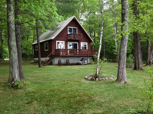 Waterfront Chalet with private beach in the White Mountains of New Hampshire.