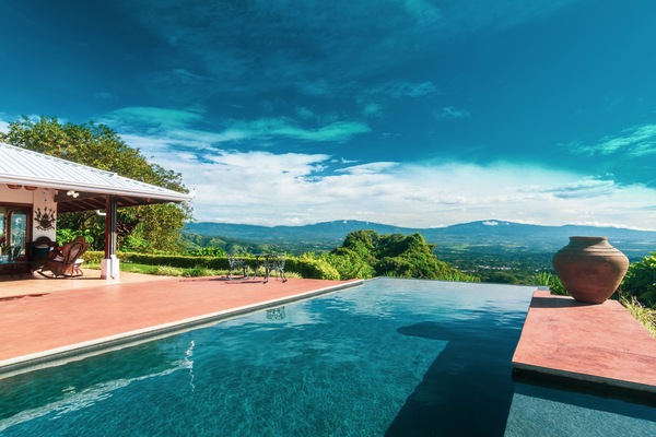 infinite solar heated pool with view of St Jose and 4 volcanos