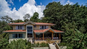 A two-story house with a tiled roof, surrounded by lush greenery and a stone staircase leading to the entrance. - Villa Bella Vista:  Views, Privacy & Beach Proximity, We Have It All Right Here (manuel antonio)