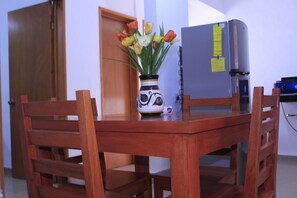 Fridge, microwave, stovetop, cookware/dishes/utensils