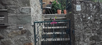 Typical house with garden and veranda in ancient village