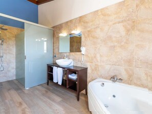 Bathtub, hair dryer, towels