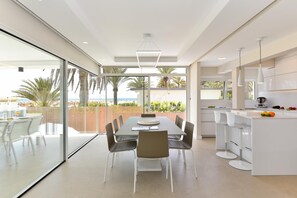 Enjoy dining and socializing in this spacious dining area with a large table and comfortable seating for six.
