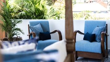 Phòng Suite Premium, 1 giường cỡ queen, hiên, quang cảnh vườn | Tiện nghi tại phòng