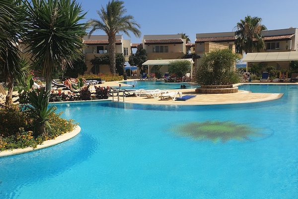 1 of the 3 pools plus kids pool.