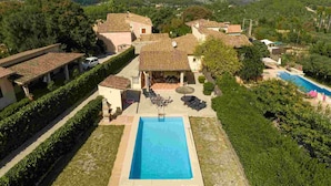 A residential property with a swimming pool, multiple houses, and a mountainous backdrop. - Can Bajoca 2 , beautiful peaceful surroundings (Pollensa)