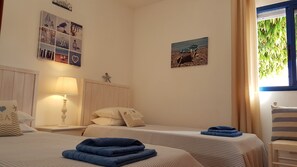 3 bedrooms, in-room safe, iron/ironing board, travel cot