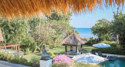 Fabulous huvila aivan rannalla, jossa suuri uima-allas, trooppinen puutarha ja henkilökunta