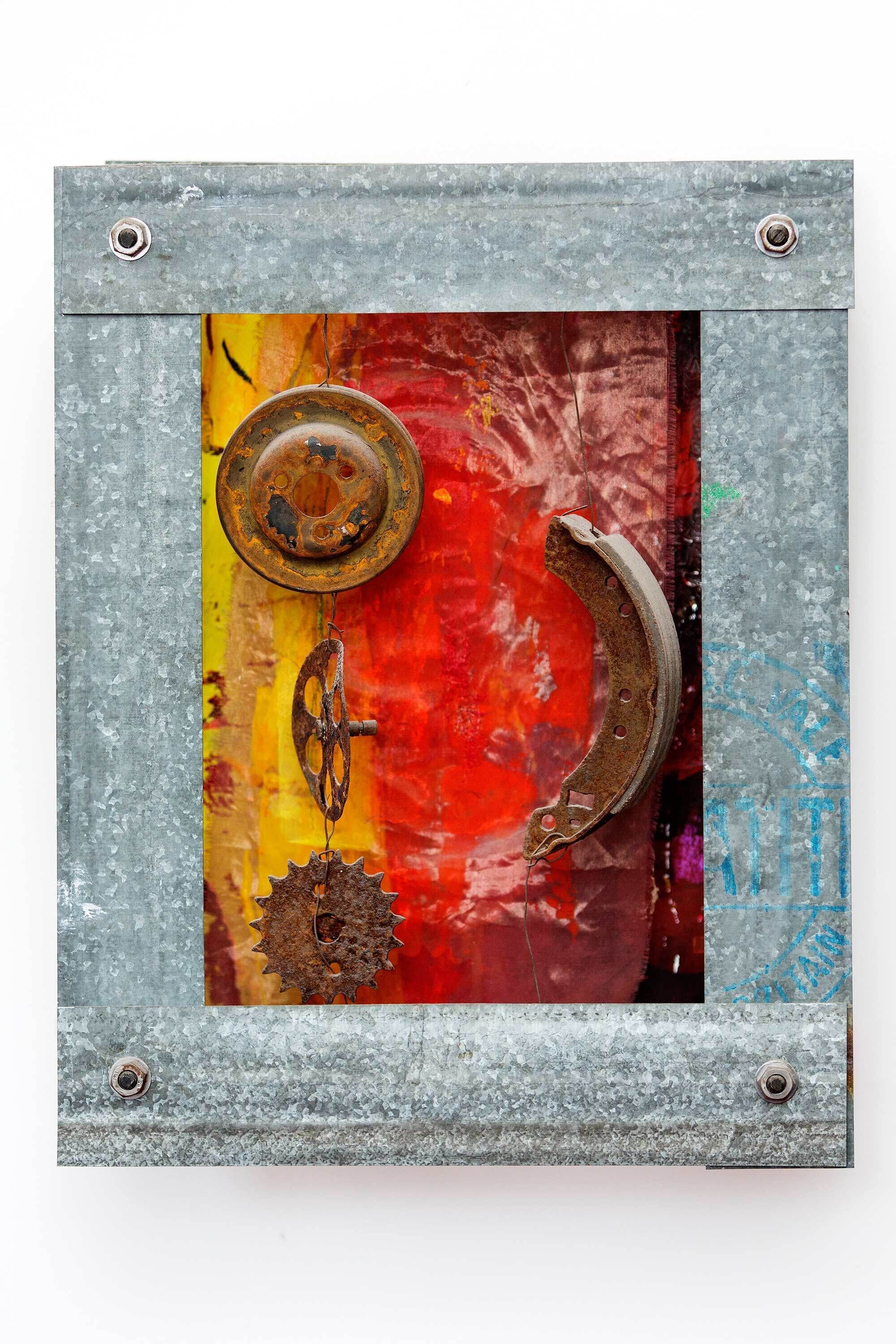 A metallic frame with a rustic, industrial design.