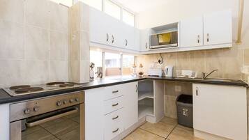 Standard Apartment, 2 Bedrooms | Private kitchen | Microwave, oven, dishwasher, coffee/tea maker