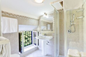 Bathtub, hair dryer, bidet