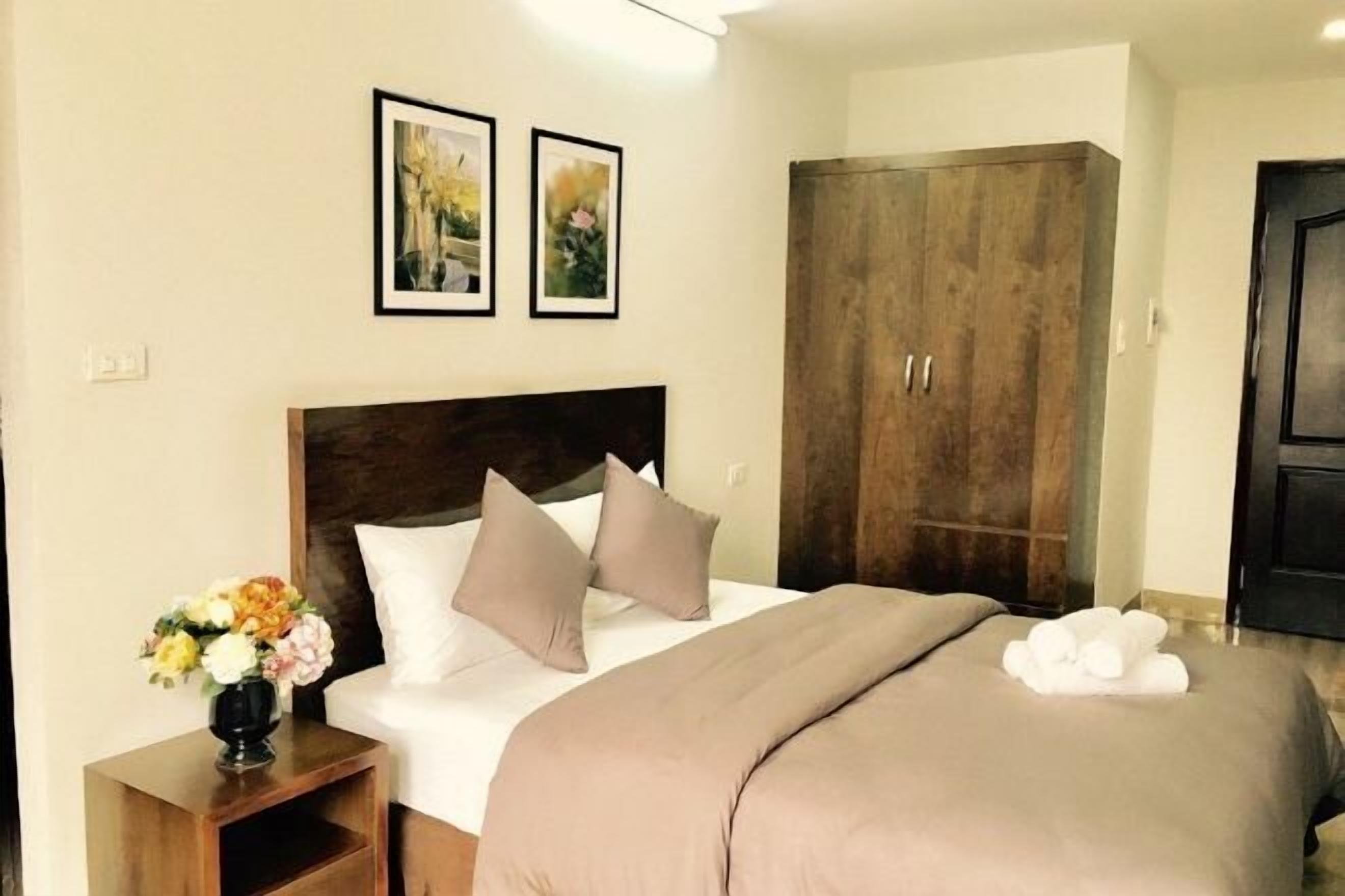 Desk, laptop workspace, blackout drapes, iron/ironing board