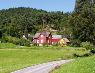 Cozy three-bedroom cottage located on a working farm by the stunning BjornaFjord