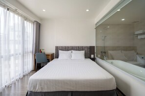 Deluxe Apartment, 1 Bedroom | Desk, laptop workspace, soundproofing, iron/ironing board - Granda Suites Hanoi (Hanoi)