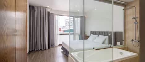 Deluxe Apartment, 1 Bedroom | Desk, laptop workspace, soundproofing, iron/ironing board